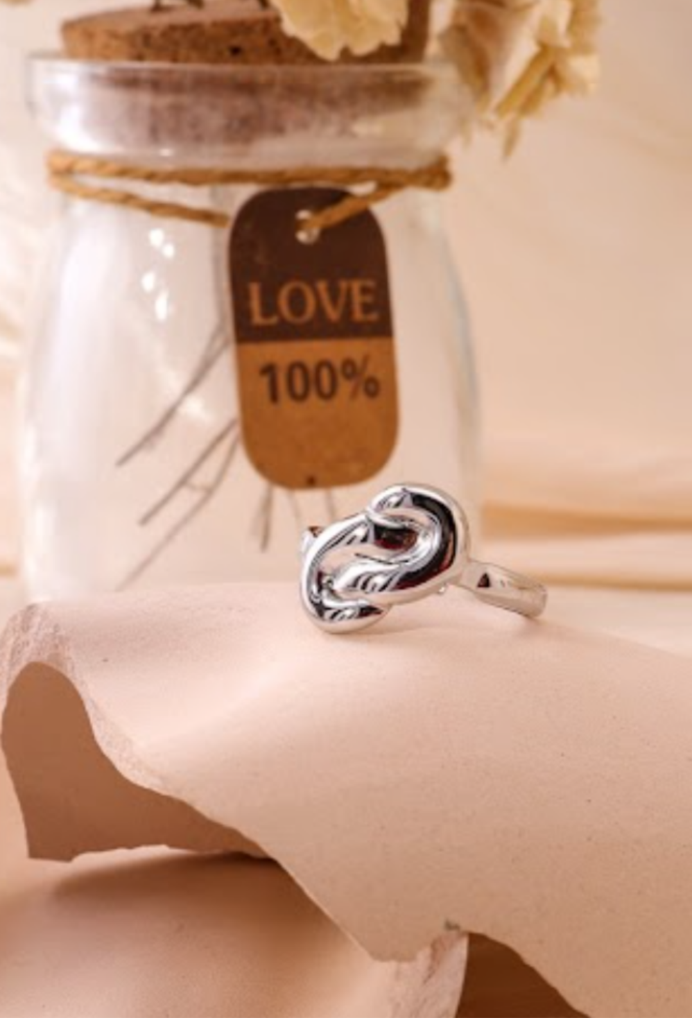 Bague dorée nœud