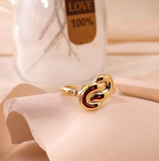 Bague dorée nœud