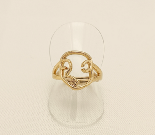 Bague dorée visage abstrait